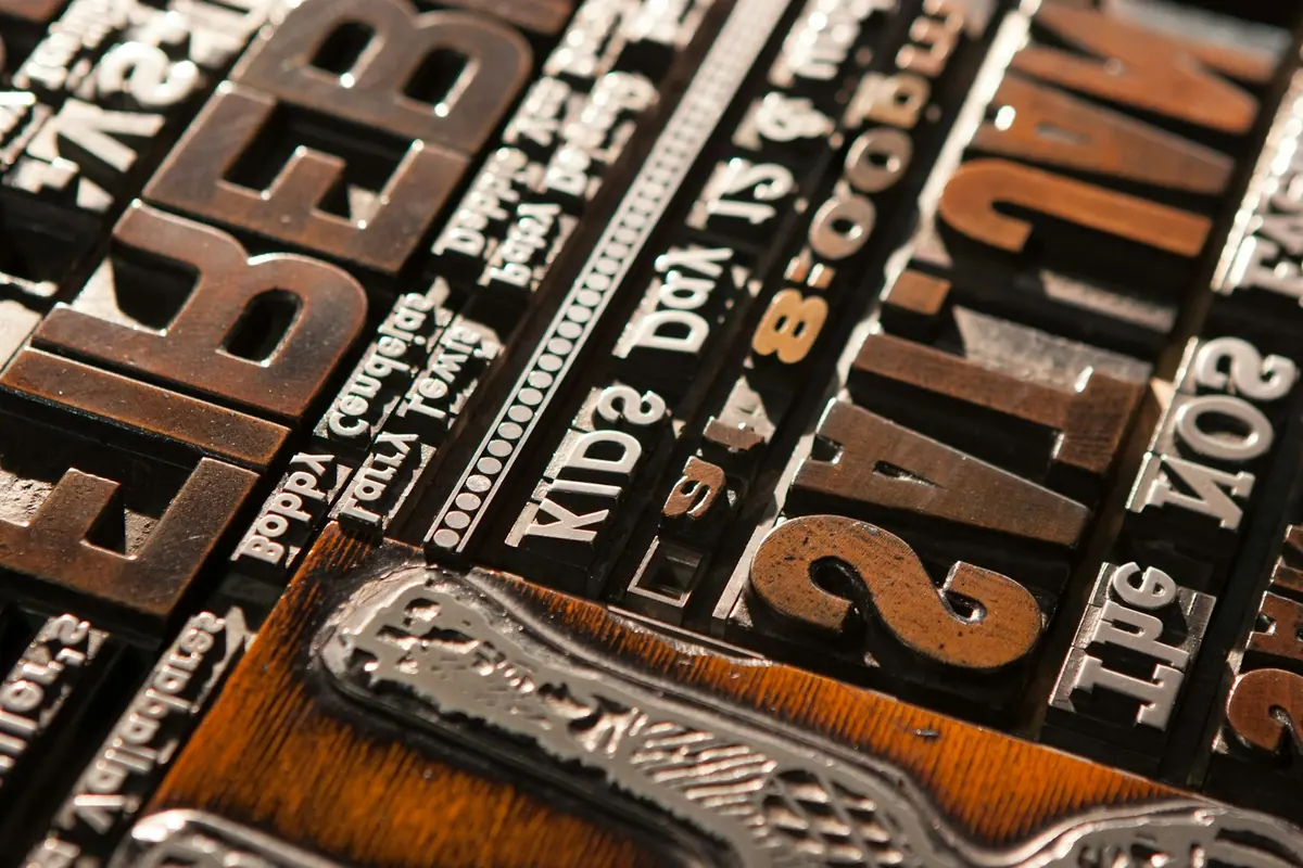 Close-up of wooden letterpress type blocks