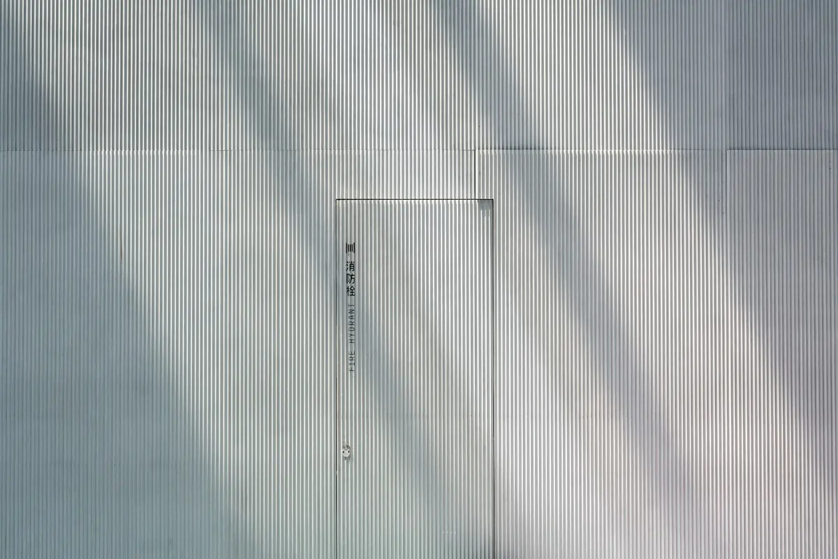 Soft daylight falling across a pale wall