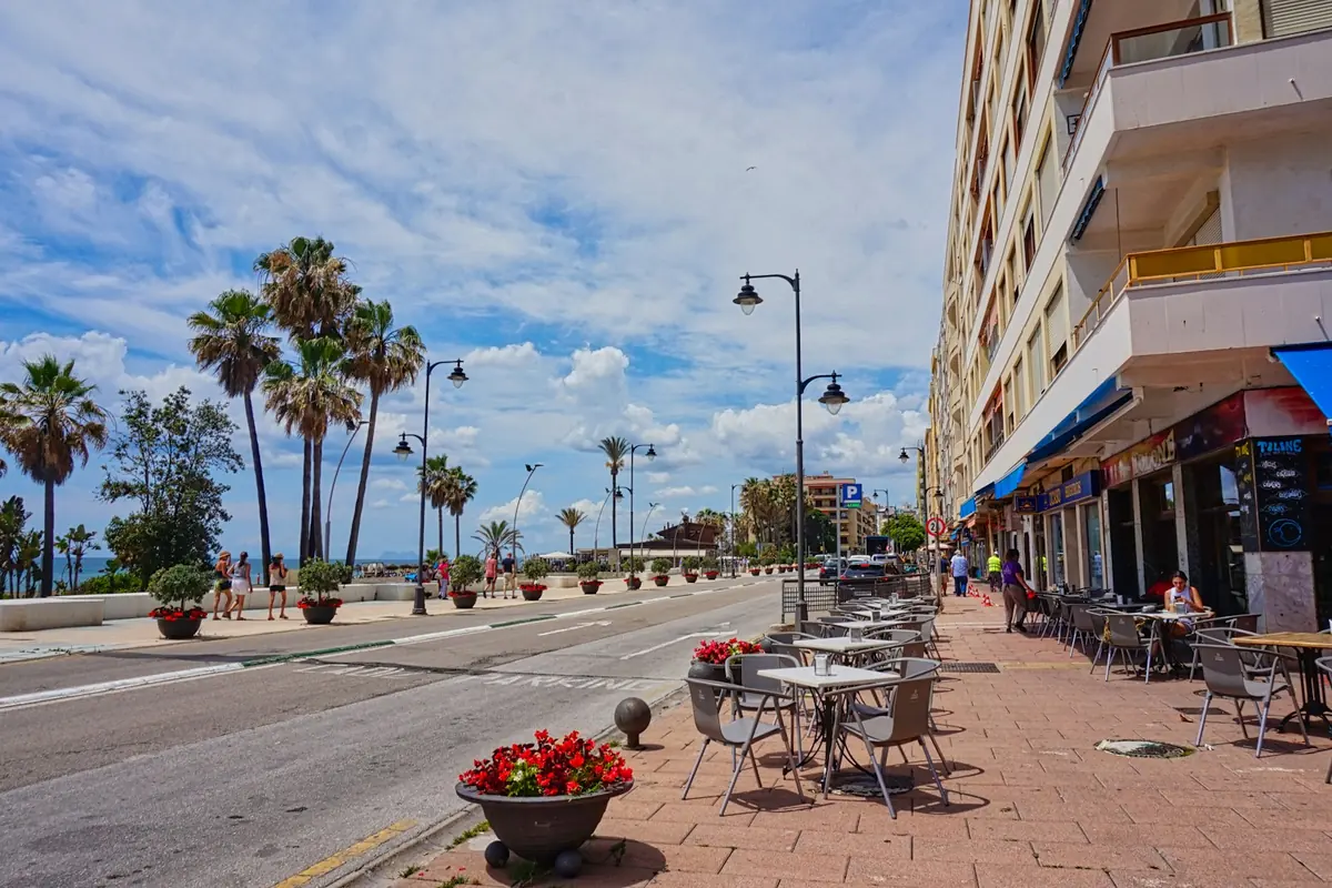 Seafront promenade with cafe terraces on the Costa del Sol